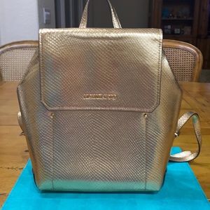 Michael Kors  Yellow Gold bag packed, 121/2 L- 12 W - 4 1/4 D like new